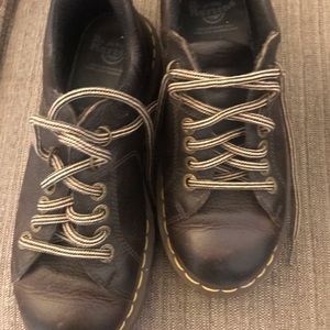 Women’s Dr. Martens dark brown low boot.